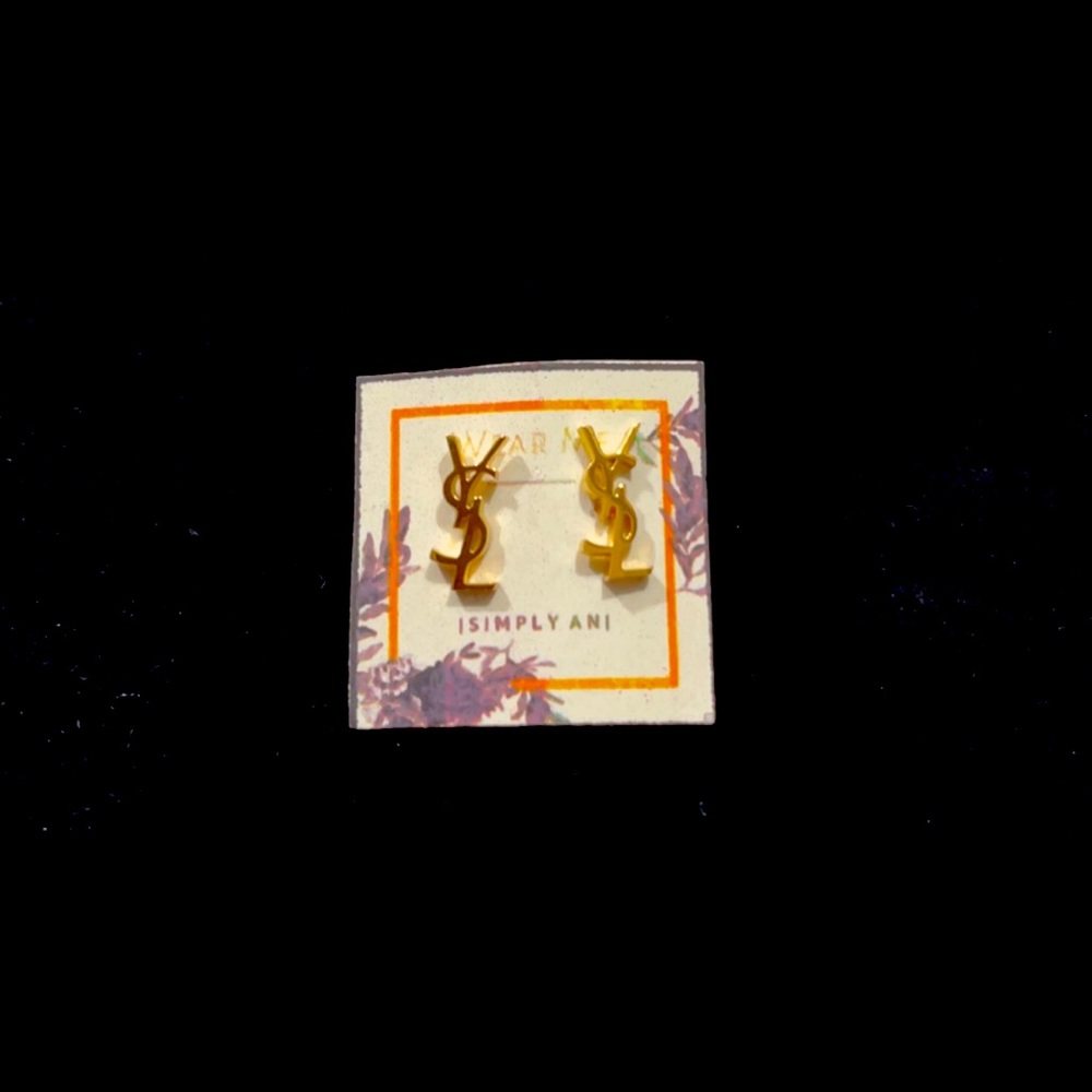 Brand new YSL stud earrings